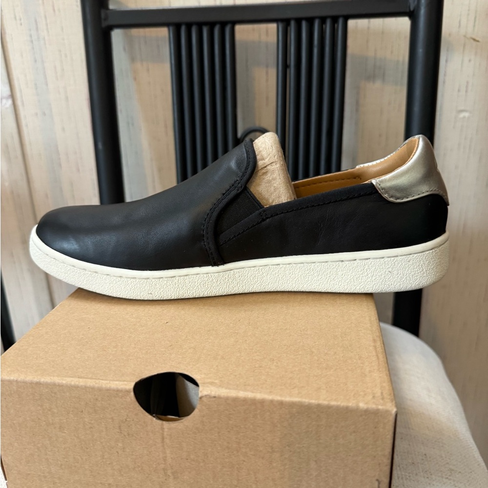 Ugg Cas Slip On Black Leather with metallic silver Brand New in box